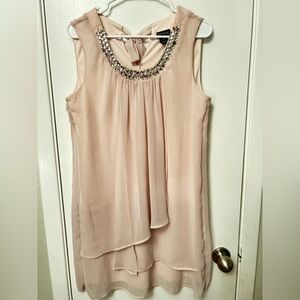 Enfocus Studio Elegant Sleeveless Blush Top with Embellished Neckline